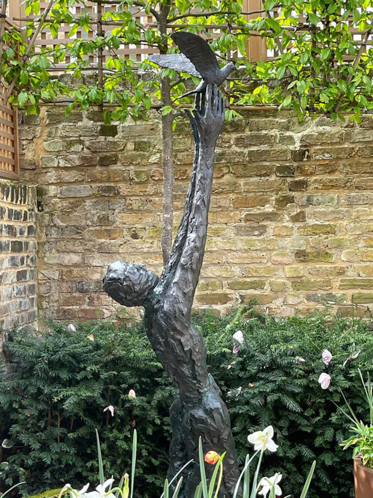Speak to us of Freedom, in situ in the garden of a house in Chelsea - close up The sculpture in-situ