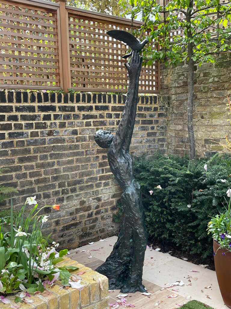 Speak to us of Freedom, in situ in the garden of a house in Chelsea The sculpture in-situ